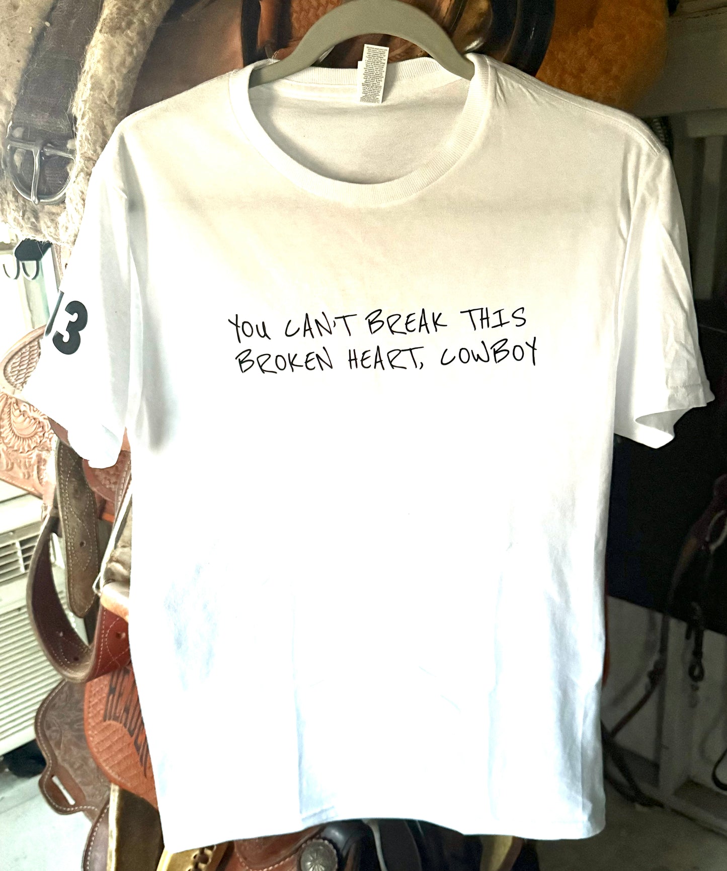 you can’t break this broken heart cowboy. T-shirt